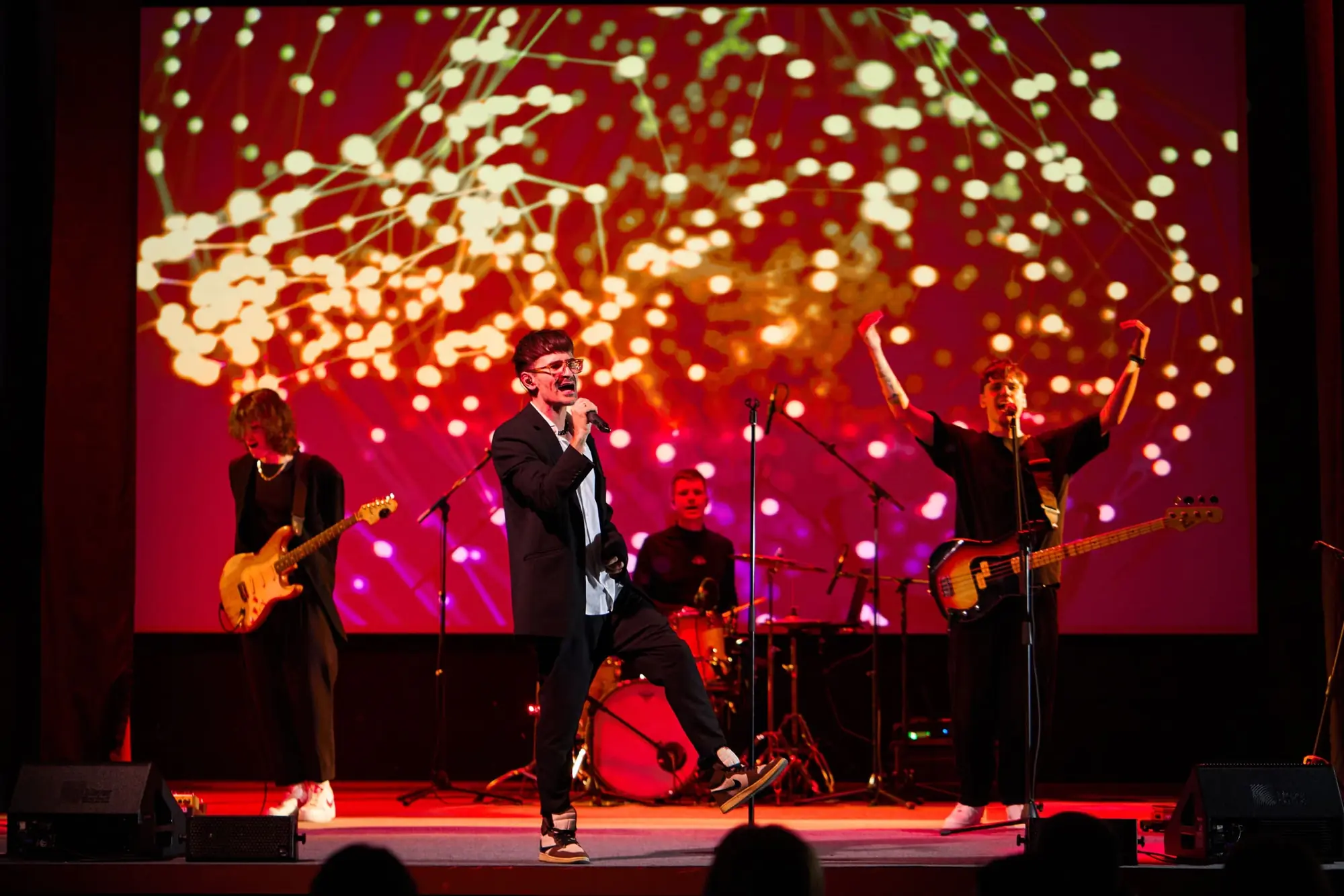 Live band performing against the BIG DAY NEW ERA multimedia backdrop